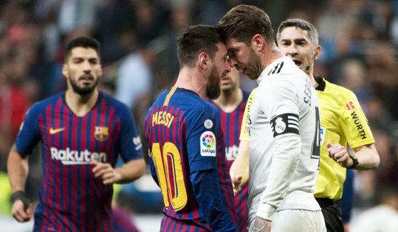 Barcelona's Argentinian forward Lionel Messi (2L) argues with Real Madrid's Spanish defender Sergio Ramos during the Spanish league football match between Real Madrid CF and FC Barcelona at the Santiago Bernabeu stadium in Madrid on March 2, 2019. (Photo by CURTO DE LA TORRE / AFP) (Photo credit should read CURTO DE LA TORRE/AFP/Getty Images)