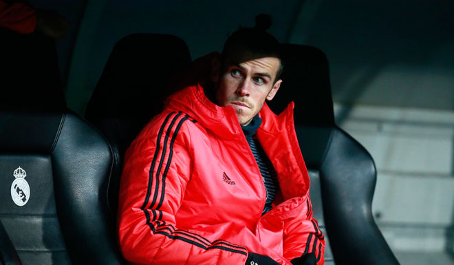 MADRID, SPAIN - DECEMBER 12: Gareth Bale of Real Madrid looks on from the bench prior to the UEFA Champions League Group G match between Real Madrid and CSKA Moscow at Bernabeu on December 12, 2018 in Madrid, Spain. (Photo by Gonzalo Arroyo Moreno/Getty Images)