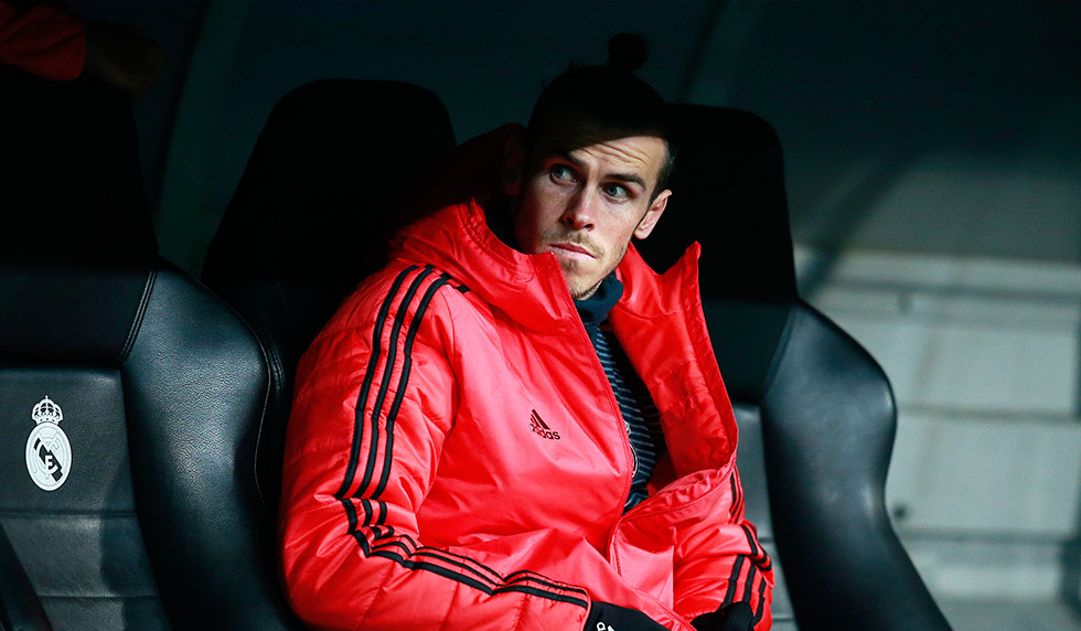 MADRID, SPAIN - DECEMBER 12: Gareth Bale of Real Madrid looks on from the bench prior to the UEFA Champions League Group G match between Real Madrid and CSKA Moscow at Bernabeu on December 12, 2018 in Madrid, Spain. (Photo by Gonzalo Arroyo Moreno/Getty Images)