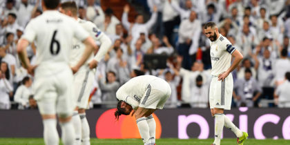 Real Madrid's French forward Karim Benzema (R) looks at Real Madrid's Welsh forward Gareth Bale as he reacts in pain during the UEFA Champions League round of 16 second leg football match between Real Madrid CF and Ajax at the Santiago Bernabeu stadium in Madrid on March 5, 2019. (Photo by GABRIEL BOUYS / AFP) (Photo credit should read GABRIEL BOUYS/AFP/Getty Images)
