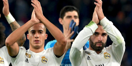 (From L) Real Madrid's Brazilian defender Marcelo, Real Madrid's Spanish midfielder Lucas Vazquez, Real Madrid's Belgian goalkeeper Thibaut Courtois (Rear) and Real Madrid's Spanish defender Dani Carvajal acknowledge the public at the end of the UEFA Champions League group G football match AS Rome vs Real Madrid on November 27, 2018 at the Olympic stadium in Rome. (Photo by Tiziana FABI / AFP) (Photo credit should read TIZIANA FABI/AFP/Getty Images)