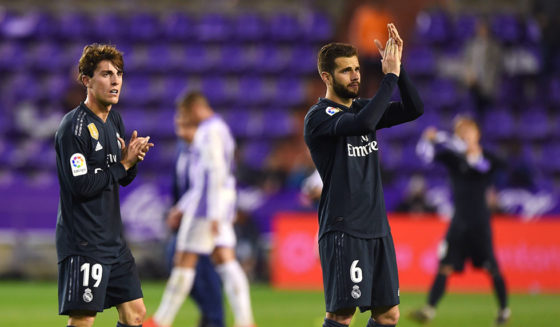 VALLADOLID, SPAIN - MARCH 10: Alvaro Odriozola (19) and Nacho of Real Madrid (6) applaud the travelling fans after the La Liga match between Real Valladolid CF and Real Madrid CF at Jose Zorrilla on March 10, 2019 in Valladolid, Spain. (Photo by Denis Doyle/Getty Images)