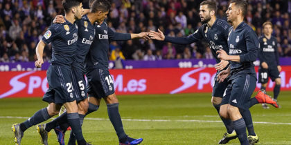 Real Madrid's French defender Raphael Varane (2L) celebrates his goal with teammates during the Spanish league football match between Real Valladolid FC and Real Madrid CF at the Jose Zorrilla stadium in Valladolid on March 10, 2019. (Photo by CESAR MANSO / AFP) (Photo credit should read CESAR MANSO/AFP/Getty Images)