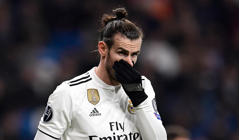 Real Madrid's Welsh forward Gareth Bale touches his nose during the UEFA Champions League group G football match between Real Madrid CF and CSKA Moscow at the Santiago Bernabeu stadium in Madrid on December 12, 2018. (Photo by JAVIER SORIANO / AFP) (Photo credit should read JAVIER SORIANO/AFP/Getty Images)