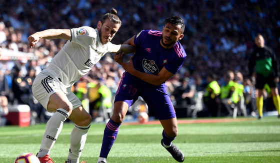 Real Madrid's Welsh forward Gareth Bale (L) vies with Celta Vigo's Moroccan midfielder Sofiane Boufal during the Spanish league football match between Real Madrid CF and RC Celta de Vigo at the Santiago Bernabeu stadium in Madrid on March 16, 2019. (Photo by GABRIEL BOUYS / AFP) (Photo credit should read GABRIEL BOUYS/AFP/Getty Images)
