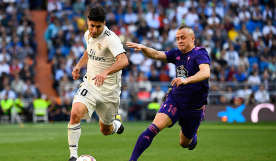 Real Madrid's Spanish midfielder Marco Asensio (L) vies with Celta Vigo's Slovak milfielder Stanislav Lobotka during the Spanish league football match between Real Madrid CF and RC Celta de Vigo at the Santiago Bernabeu stadium in Madrid on March 16, 2019. (Photo by GABRIEL BOUYS / AFP) (Photo credit should read GABRIEL BOUYS/AFP/Getty Images)