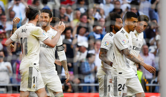 Real Madrid's Welsh forward Gareth Bale (L) celebrates his goal with Real Madrid's Spanish defender Sergio Ramos during the Spanish league football match between Real Madrid CF and RC Celta de Vigo at the Santiago Bernabeu stadium in Madrid on March 16, 2019. (Photo by GABRIEL BOUYS / AFP) (Photo credit should read GABRIEL BOUYS/AFP/Getty Images)