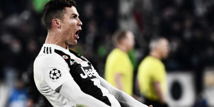 TOPSHOT - Juventus' Portuguese forward Cristiano Ronaldo celebrates after scoring 3-0 during the UEFA Champions League round of 16 second-leg football match Juventus vs Atletico Madrid on March 12, 2019 at the Juventus stadium in Turin. (Photo by Marco BERTORELLO / AFP) (Photo credit should read MARCO BERTORELLO/AFP/Getty Images)