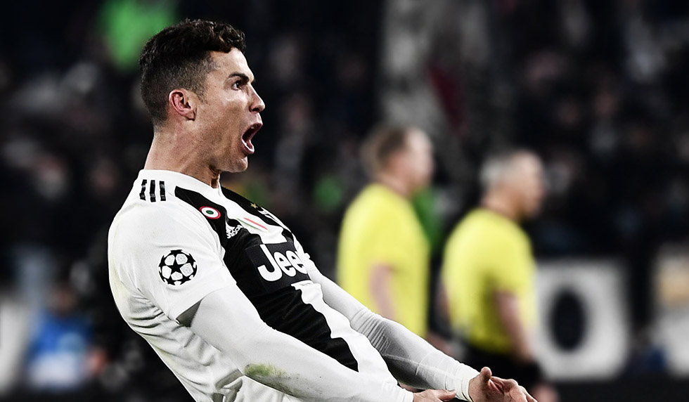 TOPSHOT - Juventus' Portuguese forward Cristiano Ronaldo celebrates after scoring 3-0 during the UEFA Champions League round of 16 second-leg football match Juventus vs Atletico Madrid on March 12, 2019 at the Juventus stadium in Turin. (Photo by Marco BERTORELLO / AFP) (Photo credit should read MARCO BERTORELLO/AFP/Getty Images)