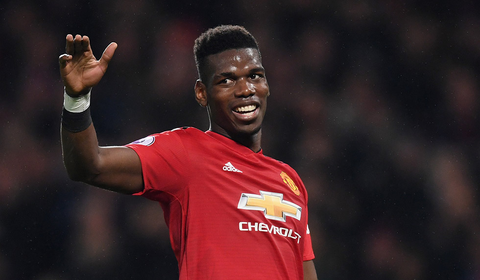 MANCHESTER, ENGLAND - DECEMBER 30: Paul Pogba of Manchester United celebrates as Marcus Rashford of Manchester United scores his team's third goal during the Premier League match between Manchester United and AFC Bournemouth at Old Trafford on December 30, 2018 in Manchester, United Kingdom. (Photo by Michael Regan/Getty Images)