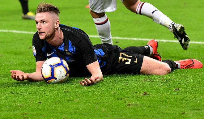 Inter Milan's Slovak defender Milan Skriniar reacts after being tackled during the Italian Serie A football match AC Milan vs Inter Milan at the San Siro stadium in Milan on March 17, 2019. (Photo by Miguel MEDINA / AFP) (Photo credit should read MIGUEL MEDINA/AFP/Getty Images)