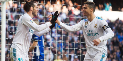 MADRID, SPAIN - FEBRUARY 24: Gareth Bale of Real Madrid celebrates with Cristiano Ronaldo after scoring his team's second goal during the La Liga match between Real Madrid and Deportivo Alaves at Estadio Santiago Bernabeu on February 24, 2018 in Madrid, Spain. (Photo by Denis Doyle/Getty Images)