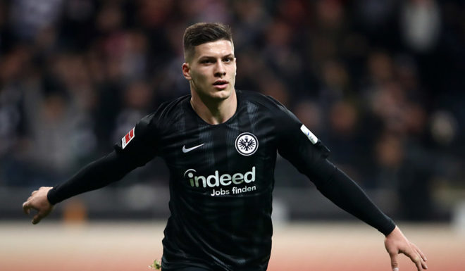 FRANKFURT AM MAIN, GERMANY - NOVEMBER 11: Luka Jovic of Eintracht Frankfurt celebrates after scoring his team's first goal during the Bundesliga match between Eintracht Frankfurt and FC Schalke 04 at Commerzbank-Arena on November 11, 2018 in Frankfurt am Main, Germany. (Photo by Alex Grimm/Bongarts/Getty Images)