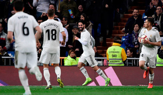 Real Madrid's Spanish midfielder Isco (C) celebrates with teammates after scoring a goal during the Spanish League football match between Real Madrid CF and SD Huesca at the Santiago Bernabeu stadium in Madrid on March 31, 2019. (Photo by JAVIER SORIANO / AFP) (Photo credit should read JAVIER SORIANO/AFP/Getty Images)