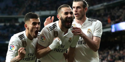 MADRID, SPAIN - MARCH 31: Karim Benzema of Real Madrid celebrates with Dani Ceballos and Gareth Bale after scoring his sides third goal during the La Liga match between Real Madrid CF and SD Huesca at Estadio Santiago Bernabeu on March 31, 2019 in Madrid, Spain. (Photo by Gonzalo Arroyo Moreno/Getty Images)