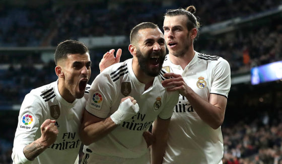 MADRID, SPAIN - MARCH 31: Karim Benzema of Real Madrid celebrates with Dani Ceballos and Gareth Bale after scoring his sides third goal during the La Liga match between Real Madrid CF and SD Huesca at Estadio Santiago Bernabeu on March 31, 2019 in Madrid, Spain. (Photo by Gonzalo Arroyo Moreno/Getty Images)