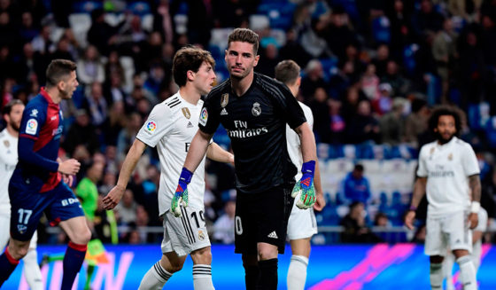 Real Madrid's French goalkeeper Luca Zidane (C) reacts after conceding a goal during the Spanish League football match between Real Madrid CF and SD Huesca at the Santiago Bernabeu stadium in Madrid on March 31, 2019. (Photo by JAVIER SORIANO / AFP) (Photo credit should read JAVIER SORIANO/AFP/Getty Images)