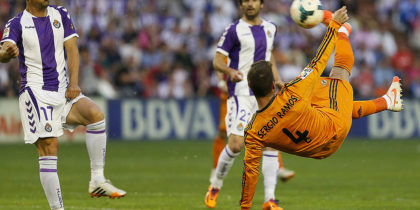 Real Madrid's defender Sergio Ramos (R) kicks the ball during the Spanish league football match Real Valladolid FC vs Real Madrid CF at Jose Zorilla stadium in Valladolid on May 7, 2014. AFP PHOTO/ CESAR MANSO (Photo credit should read CESAR MANSO/AFP/Getty Images)
