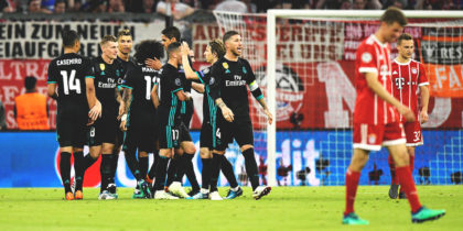 Real Madrid's Brazilian defender Marcelo (C) is congratulated by teamamtes after scoring during the UEFA Champions League semi-final first-leg football match FC Bayern Munich v Real Madrid CF in Munich, southern Germany on April 25, 2018. (Photo by GUENTER SCHIFFMANN / AFP) (Photo credit should read GUENTER SCHIFFMANN/AFP/Getty Images)