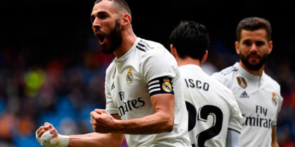 Real Madrid's French forward Karim Benzema (L) celebrates after scoring a goal during the Spanish league football match between Real Madrid CF and SD Eibar at the Santiago Bernabeu stadium in Madrid on April 6, 2019. (Photo by GABRIEL BOUYS / AFP) (Photo credit should read GABRIEL BOUYS/AFP/Getty Images)