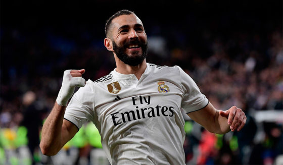 Real Madrid's French forward Karim Benzema celebrates after scoring his team's third goal during the Spanish League football match between Real Madrid CF and SD Huesca at the Santiago Bernabeu stadium in Madrid on March 31, 2019. (Photo by JAVIER SORIANO / AFP) (Photo credit should read JAVIER SORIANO/AFP/Getty Images)