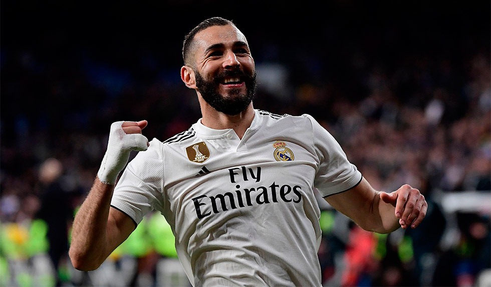 Real Madrid's French forward Karim Benzema celebrates after scoring his team's third goal during the Spanish League football match between Real Madrid CF and SD Huesca at the Santiago Bernabeu stadium in Madrid on March 31, 2019. (Photo by JAVIER SORIANO / AFP) (Photo credit should read JAVIER SORIANO/AFP/Getty Images)