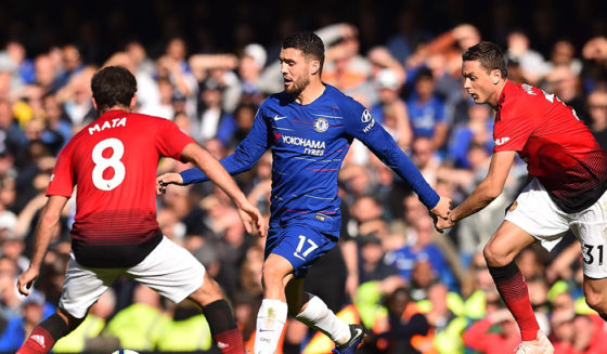 Chelsea's Croatian midfielder Mateo Kovacic (C) vies with Manchester United's Spanish midfielder Juan Mata (L) and Manchester United's Serbian midfielder Nemanja Matic (R) during the English Premier League football match between Chelsea and Manchester United at Stamford Bridge in London on October 20, 2018. (Photo by Glyn KIRK / AFP) / RESTRICTED TO EDITORIAL USE. No use with unauthorized audio, video, data, fixture lists, club/league logos or 'live' services. Online in-match use limited to 120 images. An additional 40 images may be used in extra time. No video emulation. Social media in-match use limited to 120 images. An additional 40 images may be used in extra time. No use in betting publications, games or single club/league/player publications. / (Photo credit should read GLYN KIRK/AFP/Getty Images)