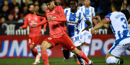 Real Madrid's Spanish midfielder Marco Asensio (L) controls the ball during the Spanish league football match between Club Deportivo Leganes SAD and Real Madrid CF at the Estadio Municipal Butarque in Leganes on April 15, 2019. (Photo by PIERRE-PHILIPPE MARCOU / AFP) (Photo credit should read PIERRE-PHILIPPE MARCOU/AFP/Getty Images)