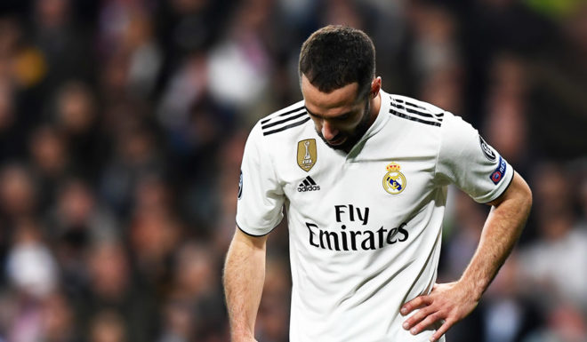 Real Madrid's Spanish defender Dani Carvajal reacts during the UEFA Champions League round of 16 second leg football match between Real Madrid CF and Ajax at the Santiago Bernabeu stadium in Madrid on March 5, 2019. (Photo by GABRIEL BOUYS / AFP) (Photo credit should read GABRIEL BOUYS/AFP/Getty Images)