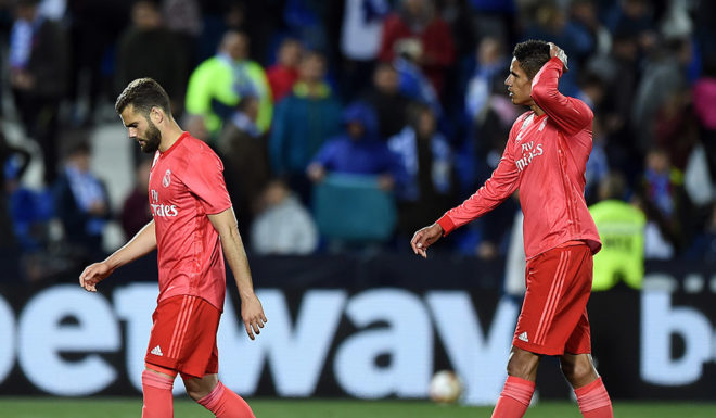LEGANES, SPAIN - APRIL 15: Nacho Fernandez and Raphael Varane of Real Madrid react after the 1-1 draw in the La Liga match between CD Leganes and Real Madrid CF at Estadio Municipal de Butarque on April 15, 2019 in Leganes, Spain. (Photo by Denis Doyle/Getty Images)