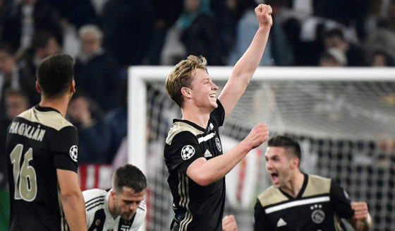 Ajax's Dutch midfielder Frenkie de Jong (C) celebrates at the end of the UEFA Champions League quarter-final second leg football match Juventus vs Ajax Amsterdam on April 16, 2019 at the Juventus stadium in Turin. (Photo by Filippo MONTEFORTE / AFP) (Photo credit should read FILIPPO MONTEFORTE/AFP/Getty Images)