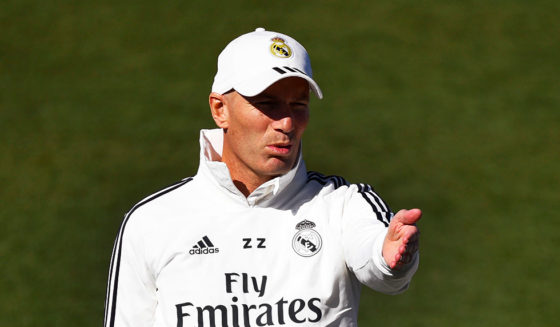 Real Madrid's French coach Zinedine Zidane (L) talks to French coaching assistant David Bettoni during a training session at the Valdebebas training facilities in Madrid on March 15, 2019. (Photo by GABRIEL BOUYS / AFP) (Photo credit should read GABRIEL BOUYS/AFP/Getty Images)