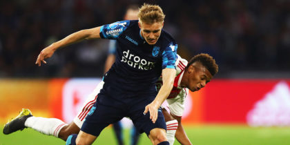 AMSTERDAM, NETHERLANDS - APRIL 23: Martin Odegaard of Vitesse battles for the ball with David Neres of Ajax during the Eredivisie match between Ajax and Vitesse at Johan Cruyff Arena on April 23, 2019 in Amsterdam, Netherlands. (Photo by Dean Mouhtaropoulos/Getty Images)