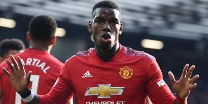 Manchester United's French midfielder Paul Pogba celebrates after he scores the team's first goal during the English Premier League football match between Manchester United and West Ham United at Old Trafford in Manchester, north west England, on April 13, 2019. (Photo by Paul ELLIS / AFP) / RESTRICTED TO EDITORIAL USE. No use with unauthorized audio, video, data, fixture lists, club/league logos or 'live' services. Online in-match use limited to 120 images. An additional 40 images may be used in extra time. No video emulation. Social media in-match use limited to 120 images. An additional 40 images may be used in extra time. No use in betting publications, games or single club/league/player publications. / (Photo credit should read PAUL ELLIS/AFP/Getty Images)