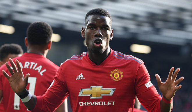 Manchester United's French midfielder Paul Pogba celebrates after he scores the team's first goal during the English Premier League football match between Manchester United and West Ham United at Old Trafford in Manchester, north west England, on April 13, 2019. (Photo by Paul ELLIS / AFP) / RESTRICTED TO EDITORIAL USE. No use with unauthorized audio, video, data, fixture lists, club/league logos or 'live' services. Online in-match use limited to 120 images. An additional 40 images may be used in extra time. No video emulation. Social media in-match use limited to 120 images. An additional 40 images may be used in extra time. No use in betting publications, games or single club/league/player publications. / (Photo credit should read PAUL ELLIS/AFP/Getty Images)
