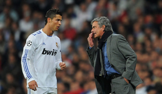 MADRID, SPAIN - OCTOBER 19: Head Coach Jose Mourinho (R) of Real Madrid instructs Cristiano Ronaldo during the UEFA Champions League group G match between Real Madrid and AC Milan at the Estadio Santiago Bernabeu on October 19, 2010 in Madrid, Spain. (Photo by Jasper Juinen/Getty Images)