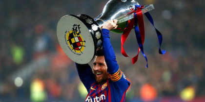 Barcelona's Argentinian forward Lionel Messi celebrates with the Liga trophy as Barcelona won their 26th league title after the Spanish League football match between Barcelona and Levante at the Camp Nou stadium in Barcelona on April 27, 2019. (Photo by PAU BARRENA / AFP) (Photo credit should read PAU BARRENA/AFP/Getty Images)