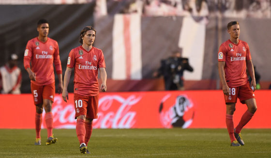 Real Madrid MADRID, SPAIN - APRIL 28: Raphaël Varane, Luka Modric and Marcos Llorente of Real Madrid look dejected during the La Liga match between Rayo Vallecano de Madrid and Real Madrid CF at Campo de Futbol de Vallecas on April 28, 2019 in Madrid, Spain. (Photo by Denis Doyle/Getty Images)
