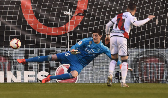 MADRID, SPAIN - APRIL 28: Thibaut Courtois of Real Madrid fails to save the penalty shot by Adri Embarba of Rayo Vallenco during the La Liga match between Rayo Vallecano de Madrid and Real Madrid CF at Campo de Futbol de Vallecas on April 28, 2019 in Madrid, Spain. (Photo by Denis Doyle/Getty Images)
