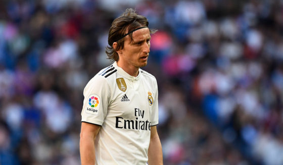 Luka Modrić TOPSHOT - Real Madrid's Croatian midfielder Luka Modric walks on the pitch during the Spanish league football match between Real Madrid CF and RC Celta de Vigo at the Santiago Bernabeu stadium in Madrid on March 16, 2019. (Photo by GABRIEL BOUYS / AFP) (Photo credit should read GABRIEL BOUYS/AFP/Getty Images)