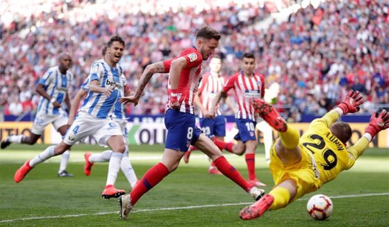 MADRID, SPAIN - MARCH 09: Saul Niguez of Atletico Madrid scores his team's first goal past Andriy Lunin of Leganes during the La Liga match between Club Atletico de Madrid and CD Leganes at Wanda Metropolitano on March 09, 2019 in Madrid, Spain. (Photo by Gonzalo Arroyo Moreno/Getty Images)