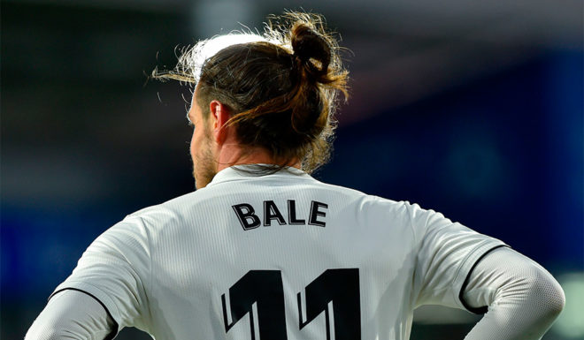 Real Madrid's Welsh forward Gareth Bale gestures during the Spanish league football match between SD Huesca and Real Madrid CF at the El Alcoraz stadium in Huesca, on December 9, 2018. (Photo by ANDER GILLENEA / AFP) (Photo credit should read ANDER GILLENEA/AFP/Getty Images)