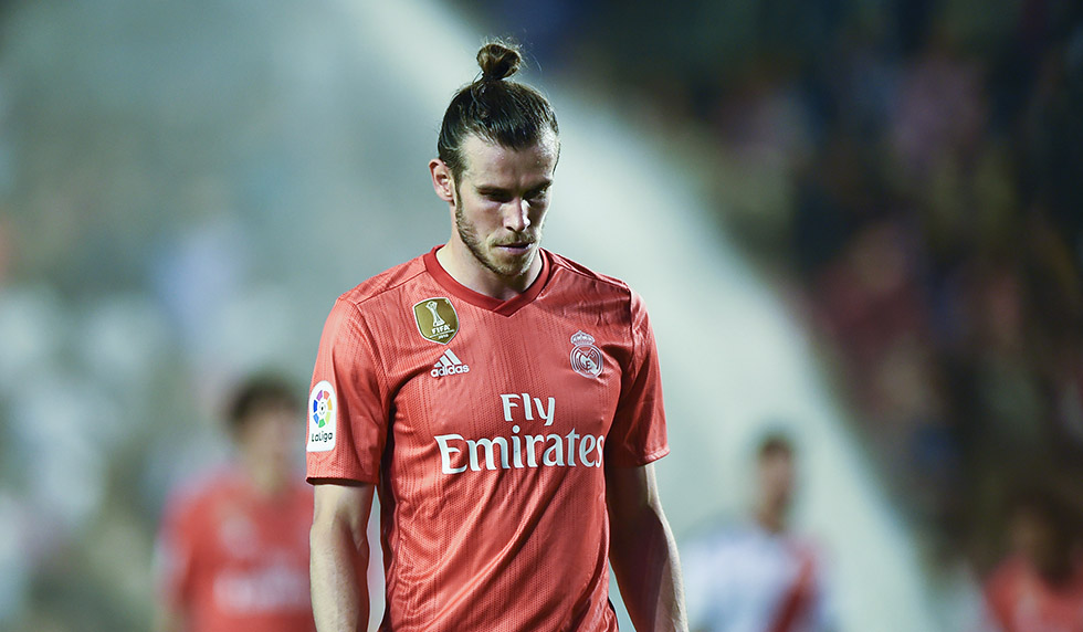 MADRID, SPAIN - APRIL 28: (EDITORS NOTE; This image was processed using digital filters.) Gareth Bale of Real Madrid looks dejected during the La Liga match between Rayo Vallecano de Madrid and Real Madrid CF at Campo de Futbol de Vallecas on April 28, 2019 in Madrid, Spain. (Photo by Denis Doyle/Getty Images)