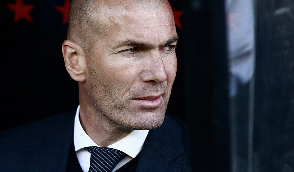 Real Madrid's French coach Zinedine Zidane attends the Spanish League football match between Rayo Vallecano and Real Madrid at the Vallecas Stadium in the Madrid district of Puente de Vallecas on April 28, 2019. (Photo by Benjamin CREMEL / AFP) (Photo credit should read BENJAMIN CREMEL/AFP/Getty Images)