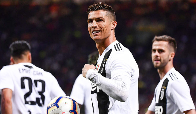 Juventus' Portuguese forward Cristiano Ronaldo (C) celebrates after scoring a goal during the Italian Serie A football match between Inter Milan and Juventus on April 27, 2019 at the San Siro stadium in Milan. (Photo by MARCO BERTORELLO / AFP) (Photo credit should read MARCO BERTORELLO/AFP/Getty Images