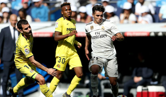 MADRID, SPAIN - MAY 05: Brahim Diaz of Real Madrid evades Manu Trigueros and Samuel Chukwueze of Villereal during the La Liga match between Real Madrid CF and Villarreal CF at Estadio Santiago Bernabeu on May 05, 2019 in Madrid, Spain. (Photo by Angel Martinez/Getty Images)