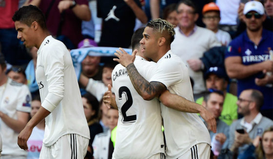 Real Madrid's Spanish-Dominican forward Mariano (R) celebrates after scoring the opening goal during the Spanish league football match between Real Madrid CF and Villarreal CF at the Santiago Bernabeu stadium in Madrid on May 5, 2019. (Photo by JAVIER SORIANO / AFP) (Photo credit should read JAVIER SORIANO/AFP/Getty Images)
