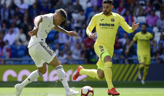 Mariano Díaz Real Madrid's Spanish-Dominican forward Mariano (L) shoots beside Villarreal's Spanish defender Alvaro Gonzalez to score the opening goal during the Spanish league football match between Real Madrid CF and Villarreal CF at the Santiago Bernabeu stadium in Madrid on May 5, 2019. (Photo by JAVIER SORIANO / AFP) (Photo credit should read JAVIER SORIANO/AFP/Getty Images)