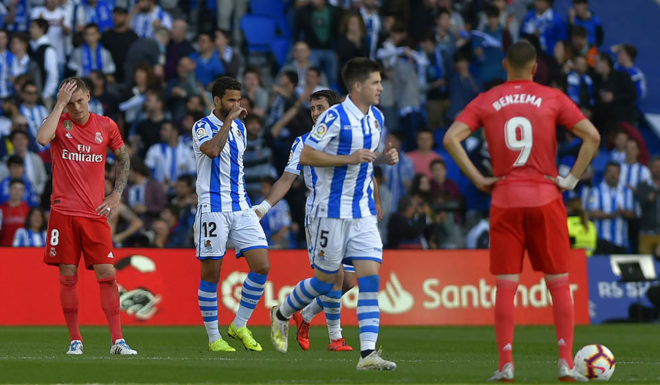 Real Sociedad's players celebrate after scoring a goal during the Spanish League football match between Real Sociedad and Real Madrid at the Anoeta Stadium in San Sebastian on May 12, 2019. (Photo by ANDER GILLENEA / AFP) (Photo credit should read ANDER GILLENEA/AFP/Getty Images)