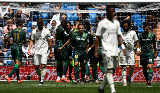 Real Betis' players celebrate their second goal during the Spanish League football match between Real Madrid and Real Betis at the Santiago Bernabeu stadium in Madrid on May 19, 2019. (Photo by PIERRE-PHILIPPE MARCOU / AFP) (Photo credit should read PIERRE-PHILIPPE MARCOU/AFP/Getty Images)